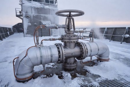Insulated and steam-traced stainless steel deck manifold valve with ice-free handwheel on a polar vessel
